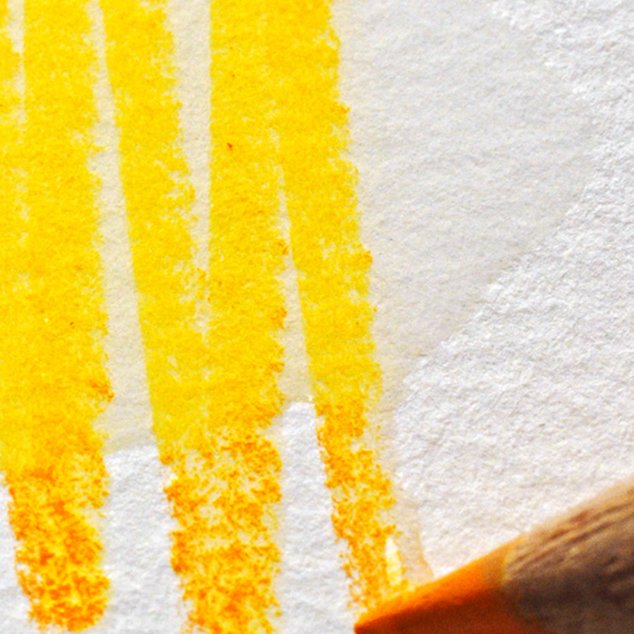 Close up of a yellow pencil mark turning from dry 